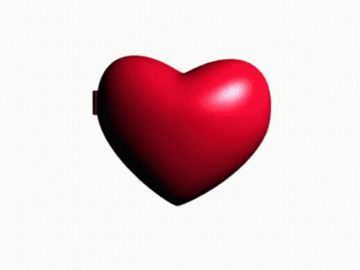 A Heart Shaped Mirror With A Man In A Suit And Tie On It GIF