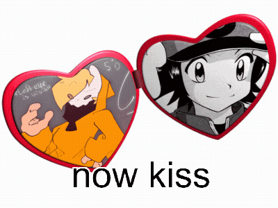 A Heart Shaped Mirror With A Picture Of A Boy And A Girl And The Words Now Kiss Below It GIF