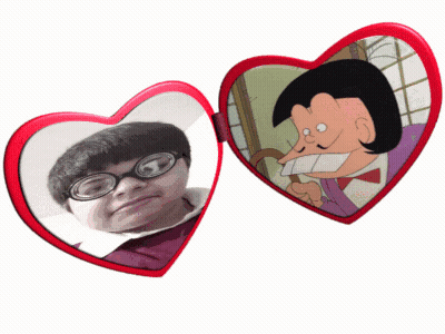 A Heart Shaped Mirror With A Picture Of A Man In Glasses GIF