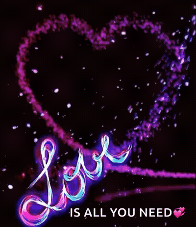 A Heart With The Words `` Love Is All You Need '' Written On It . GIF