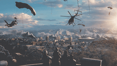 A Helicopter Is Flying Over A City With Parachutes GIF