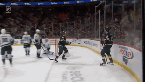 A Hockey Game Being Played In Minnesota GIF