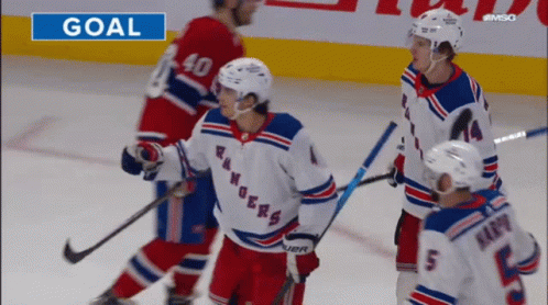 A Hockey Game Is Being Played And The Goal Is Shown On The Screen GIF