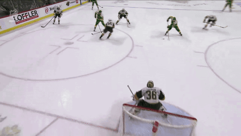 A Hockey Game Is Being Played And The Goalie Has The Number 36 On His Jersey GIF