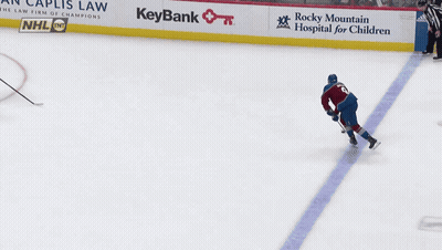 A Hockey Game Is Being Played And The Goalie Is Wearing The Number 27 GIF