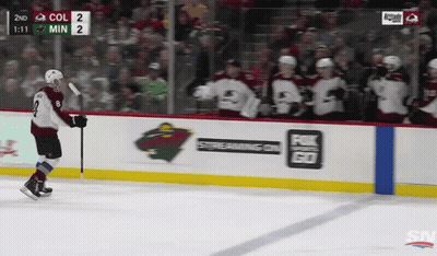 A Hockey Game Is Being Played Between The Colorado Avalanche And The Milwaukee Wild GIF