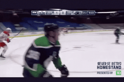 A Hockey Game Is Being Played In A Stadium And The Score Is 1 To 0 GIF
