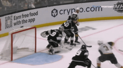 A Hockey Game Is Being Played In Front Of A Crypto.com Ad GIF