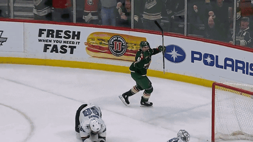 A Hockey Game Is Being Played In Front Of A Fresh When You Need It Sign GIF