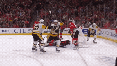 A Hockey Game Is Being Played In Front Of A Hyundai Sign GIF