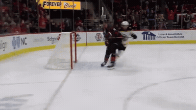 A Hockey Game Is Being Played In Front Of A Sign That Says Forever Cleats GIF