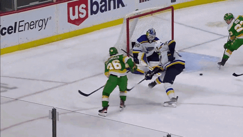 A Hockey Game Is Being Played In Front Of Us Bank Ads GIF