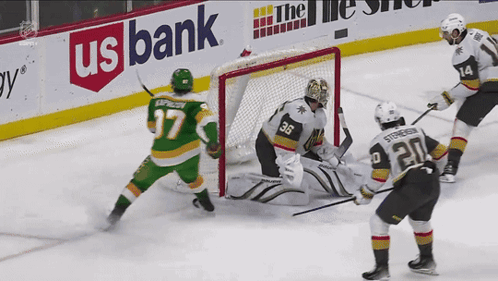 A Hockey Game Is Being Played In Front Of Us Bank Banners GIF