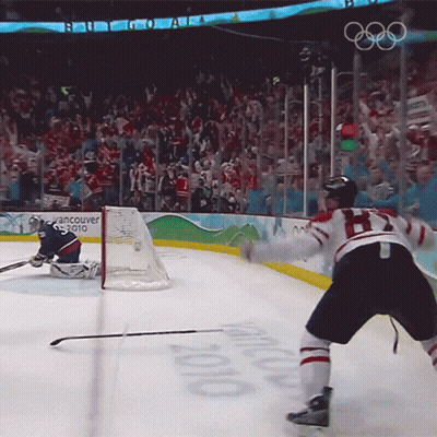 A Hockey Game Is Being Played In Vancouver In 2010 GIF