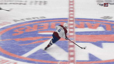 A Hockey Game Is Being Played On A Ice Rink And A Player With The Number 8 On Their Jersey GIF