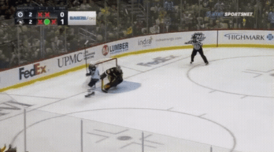 A Hockey Game Is Being Played On A Ice Rink Sponsored By Fedex And Upmc GIF