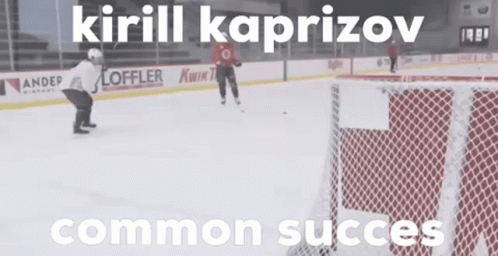 A Hockey Game Is Being Played On A Ice Rink With The Name Kirill Kaprizov On The Bottom GIF