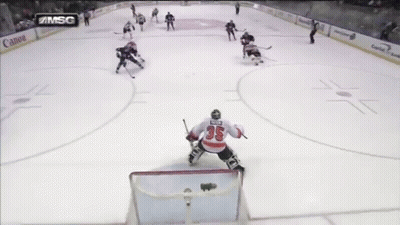 A Hockey Game Is Being Played On A Msg Channel GIF