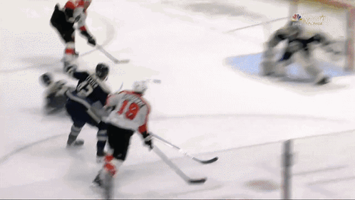 A Hockey Game Is Being Played On Nbc GIF
