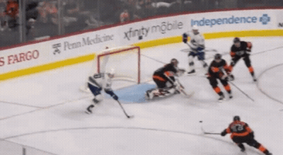 A Hockey Game Is Being Played Sponsored By Penn Medicine Xfinity Mobile And Independence GIF