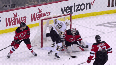 A Hockey Game Is Being Played Sponsored By Verizon GIF