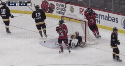 A Hockey Game Is Being Played With A Devils Check Here Banner In The Background GIF