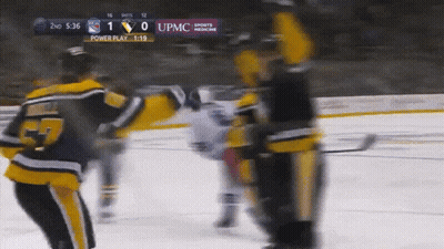 A Hockey Game Is Being Played With A Score Of 1 To 0 GIF