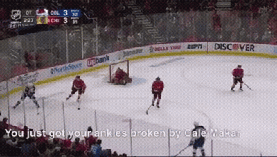 A Hockey Game Is Being Played With The Words " You Just Got Your Ankles Broken By Cale Makar " On The Bottom GIF