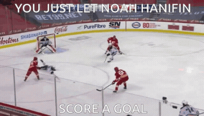 A Hockey Game Is Being Played With The Words " You Just Let Noah Hanifin Score A Goal " On The Bottom GIF
