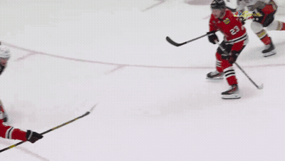 A Hockey Goalie Is Laying On The Ice In Front Of An Advertisement For Endeavor GIF