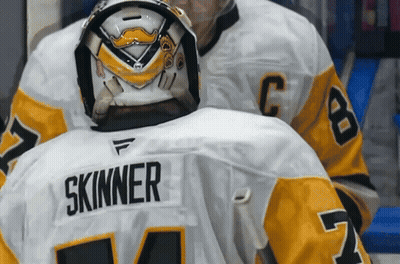 A Hockey Goalie With The Name Skinner On His Back GIF