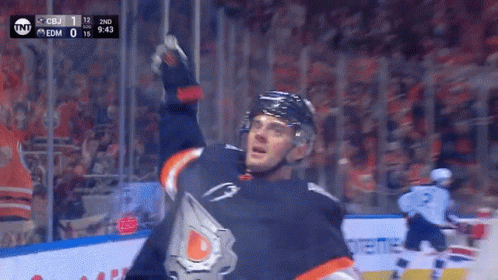 A Hockey Player Celebrates A Goal During A Game Against The Edm GIF