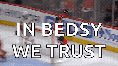 A Hockey Player Celebrates A Goal With The Words In Bedsy We Trust Below Him GIF