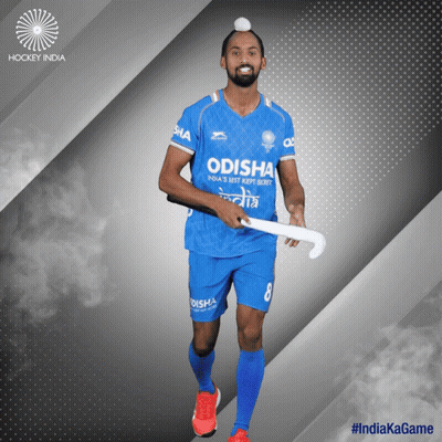 A Hockey Player From India Is Holding A Stick GIF