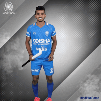 A Hockey Player From India Is Holding A Stick GIF