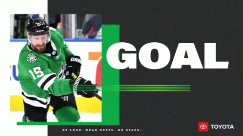 A Hockey Player In A Green Jersey With The Number 15 GIF