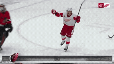 A Hockey Player In A Red And White Uniform With The Letter B On The Bottom GIF