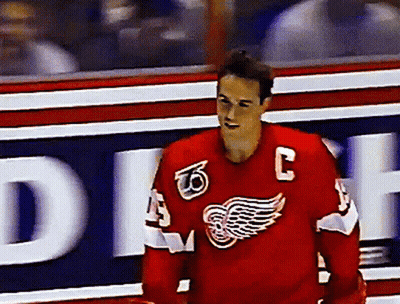 A Hockey Player In A Red Jersey With The Letter C On It GIF