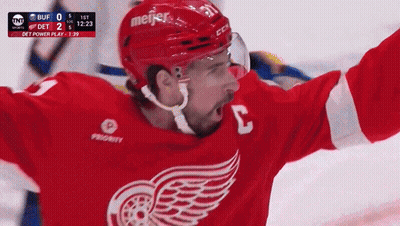 A Hockey Player In A Red Jersey With The Number 3 On It GIF