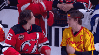 A Hockey Player In A Red Jersey With The Number 6 On It GIF