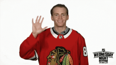 A Hockey Player In A Red Jersey With The Number 8 On It GIF