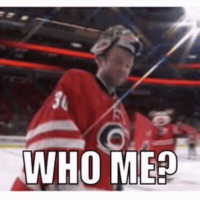 A Hockey Player Is Holding A Stick And Says Who Me . GIF