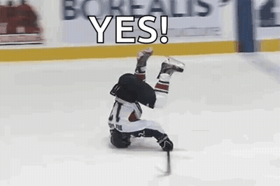 A Hockey Player Is Laying On His Back On The Ice And Says Yes . GIF