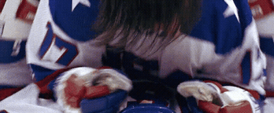 A Hockey Player Is Laying On The Ice With The Number 17 On His Jersey GIF