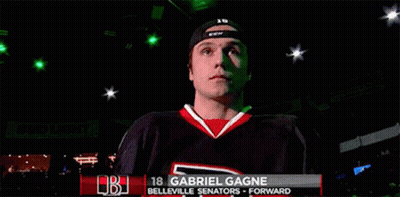 A Hockey Player Named Gabriel Gagne Is Standing In A Dark Room GIF