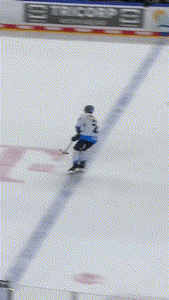 A Hockey Player On The Ice With A Banner That Says Bauer GIF