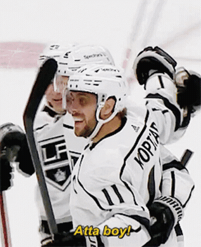 A Hockey Player Says Atta Boy While Holding His Stick GIF