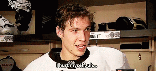 A Hockey Player Says " I Hurt Myself Uh " In His Locker Room GIF