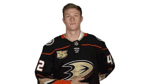 A Hockey Player Wearing A Black Jersey With The Number 35 On It Sticker