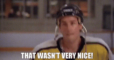 A Hockey Player Wearing A Helmet And A Yellow Jersey Is Saying `` That Wasn 'T Very Nice '' . GIF